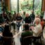 People engaged in community mental health meeting