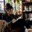 Woman journaling in therapist's office