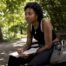 Young woman listening attentively in mental health meeting