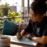 Woman journaling for mental health recovery