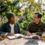 Two people discussing mental health language thoughtfully