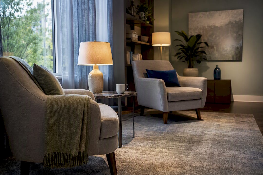 Calming therapy office with warm layered lighting