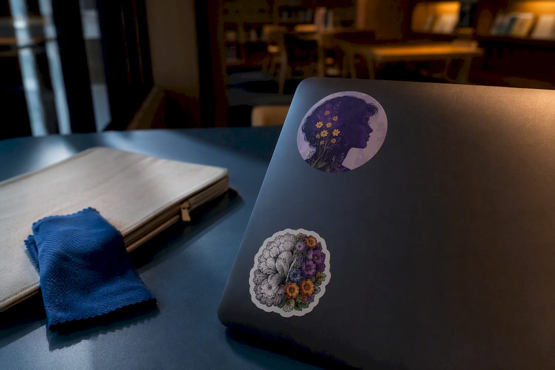 Advocacy stickers on an anonymous laptop lid