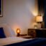 Calm dorm room with layered warm lighting