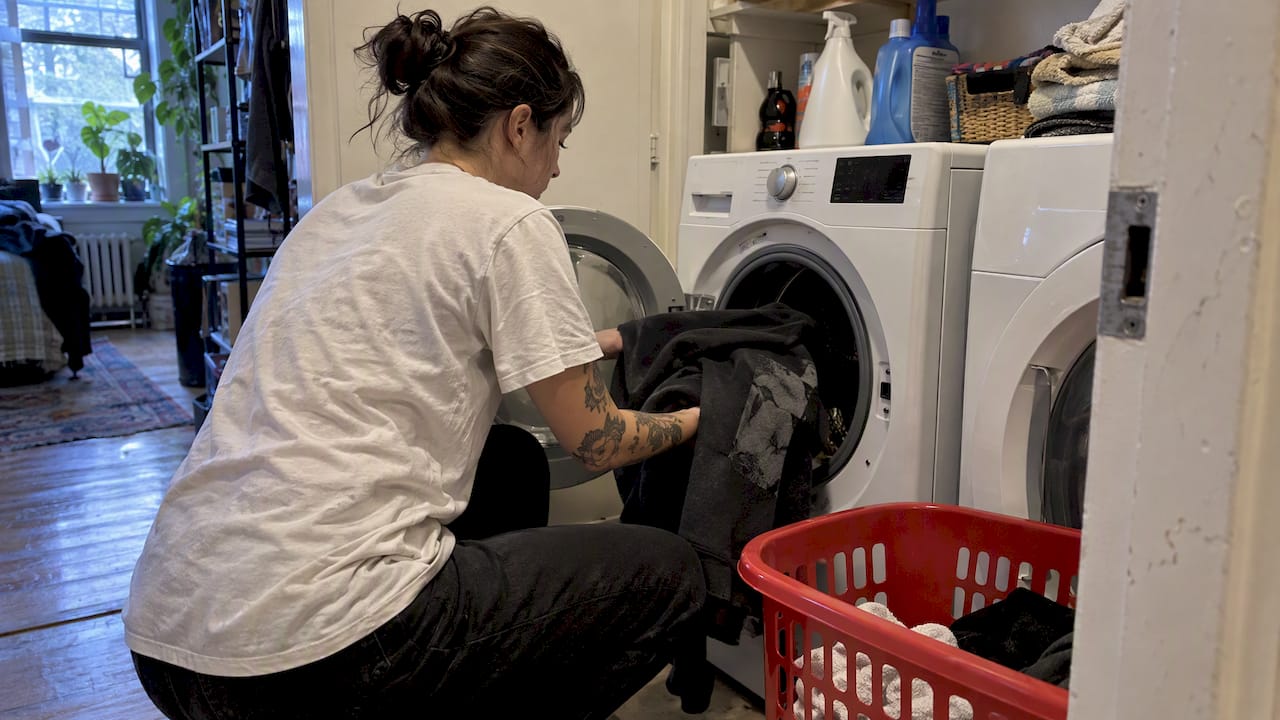 Graphic hoodie being prepared for washing