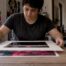 Art print tucked beneath a window mat