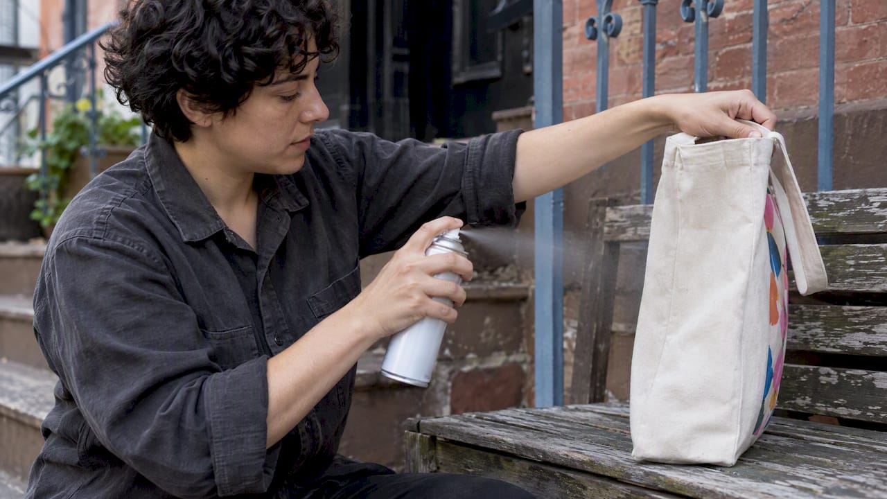 Canvas tote treated while its printed panel is protected
