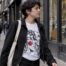 Advocate wearing expressive graphic T-shirt outdoors