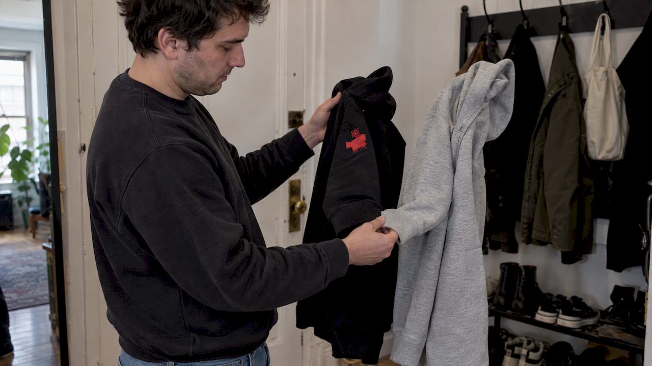 Two hoodies compared by fabric weight